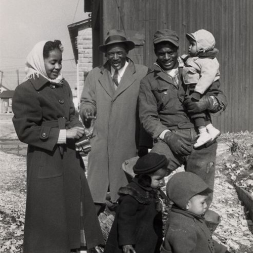A Wisconsin family portrait outside, african american